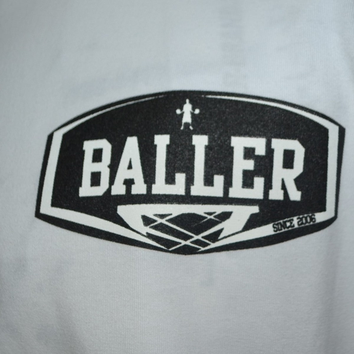 REMERA OVERSIZE BALLER BRAND TRICK