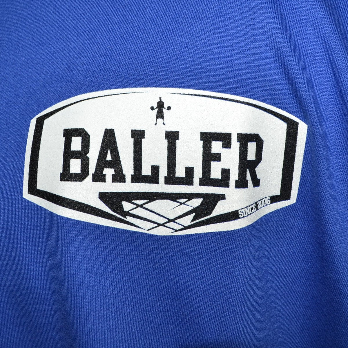 REMERA OVERSIZE BALLER BRAND TRICK